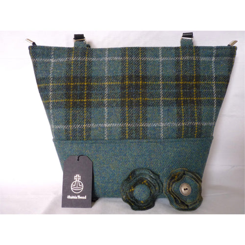 Handmade Harris Tweed Aysgarth two tone tote/ shopping bag made in beautiful green and gold check with a plain sea green base, black lining with a large zipped inner pocket and 3/4″ black leather straps