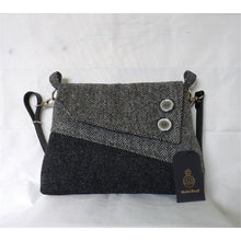 Load image into Gallery viewer, Dark grey and herringbone Harris Tweed shoulder bag with an adjustable black leather strap and a black lining with a zipped pocket