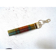 Load image into Gallery viewer, Harris Tweed wristlet kering with a clip - green multi check