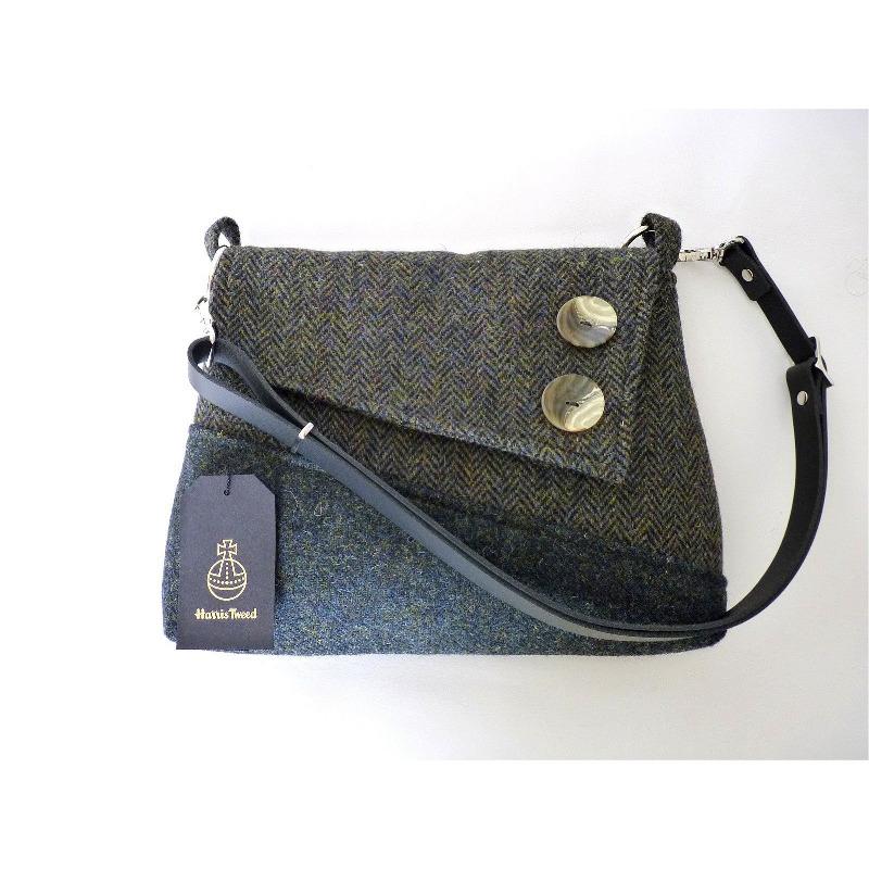 Dark green mix harris tweed shoulder bag with an adjustable black leather strap and a black lining with a zipped pocket